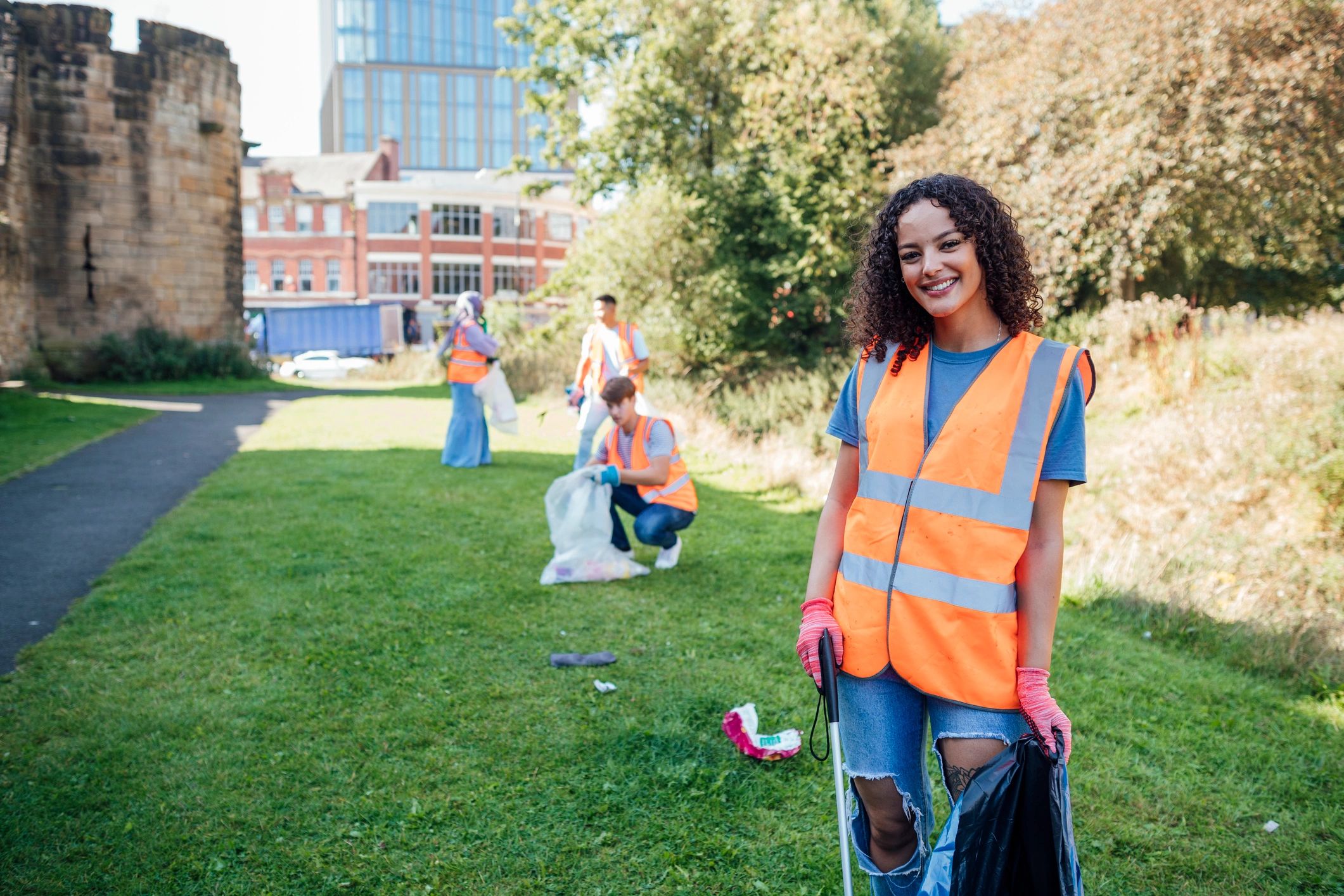 Volunteer smiling during community service effort