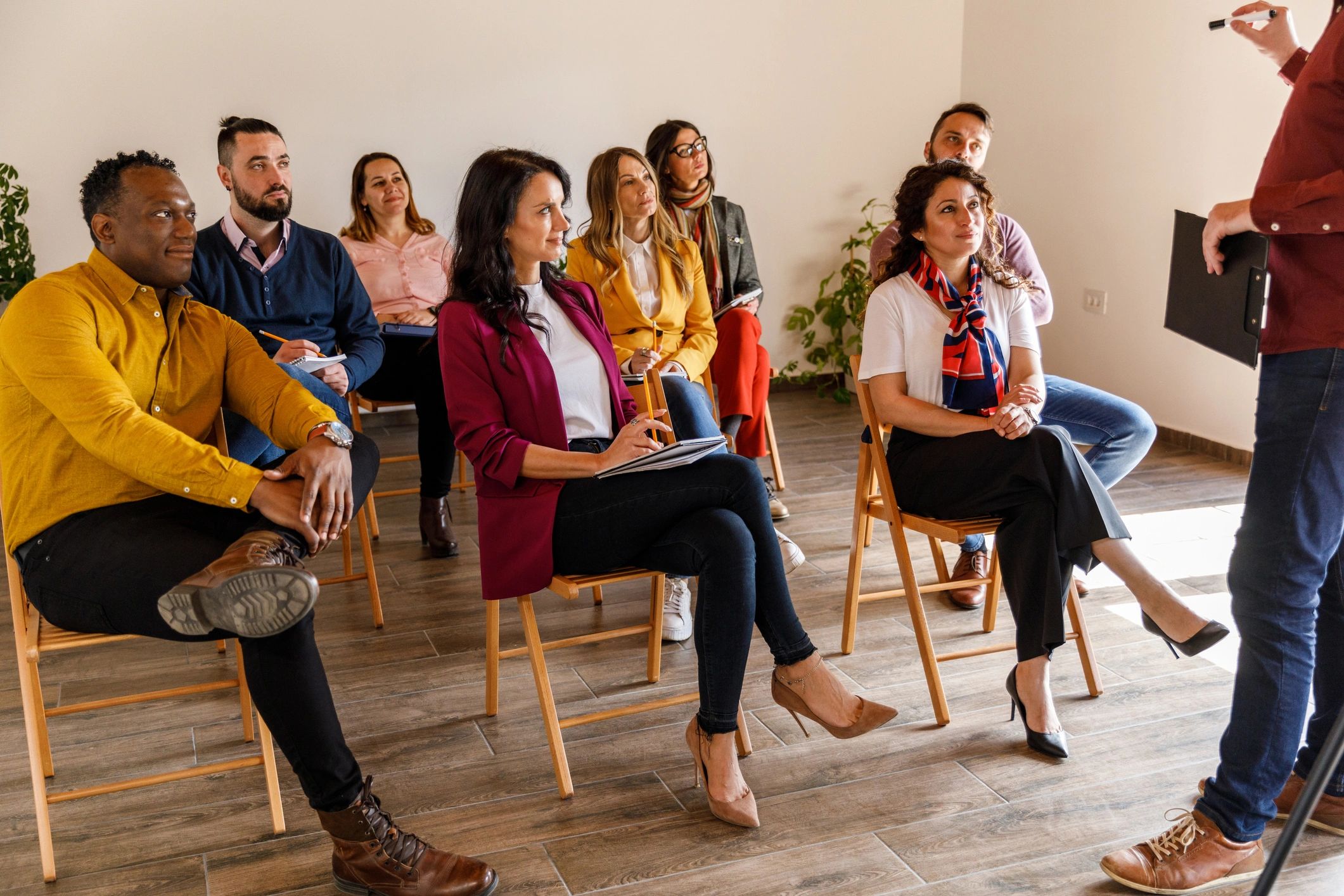 Community members listening during a public discussion